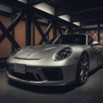 ポルシェ911のフロントバンパーへのプロテクションフィルム施工。長野の過酷な走行環境下で、飛び石傷や融雪剤による塗装ダメージを物理的に遮断し、高額査定を可能にする。